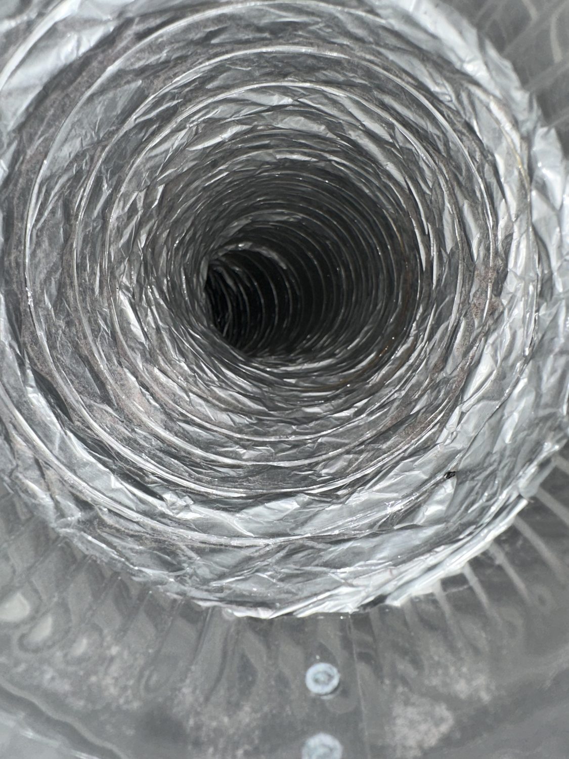 The same dryer vent clear of lint after cleaning