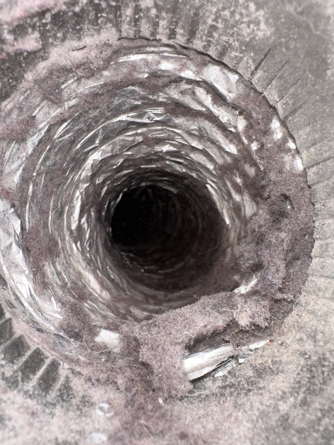 Dryer vent packed with lint before cleaning